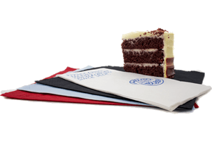A Slice Of Cake On Napkins