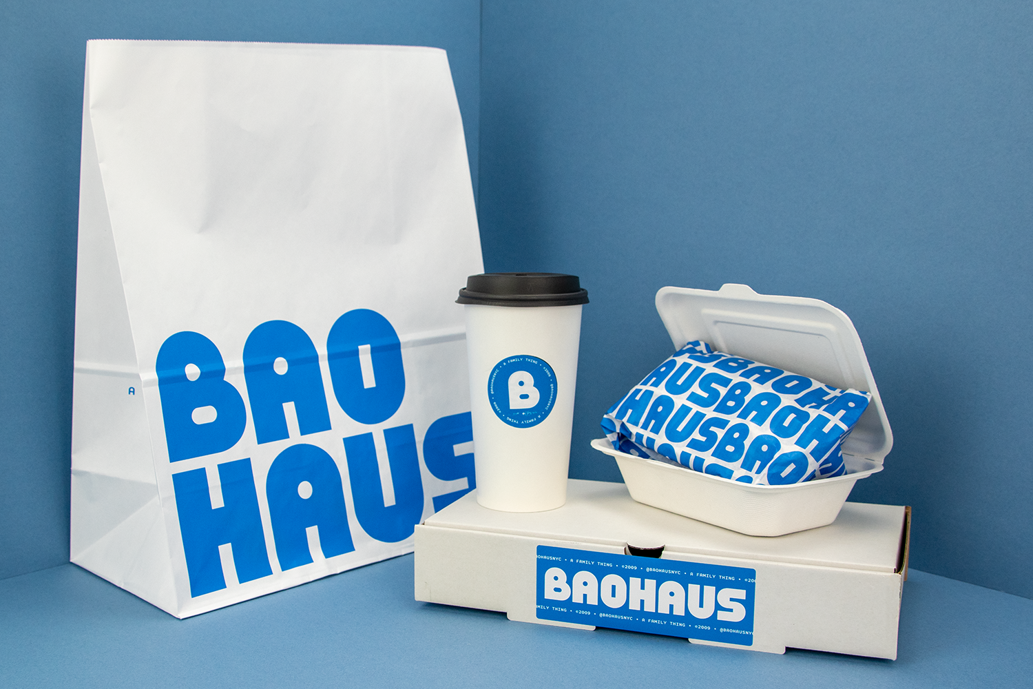 https://takeawaypackaging.co.uk/wp-content/uploads/2021/01/Baohaus-bags-stickers-and-greaseproof-paper-3-copy-2.webp