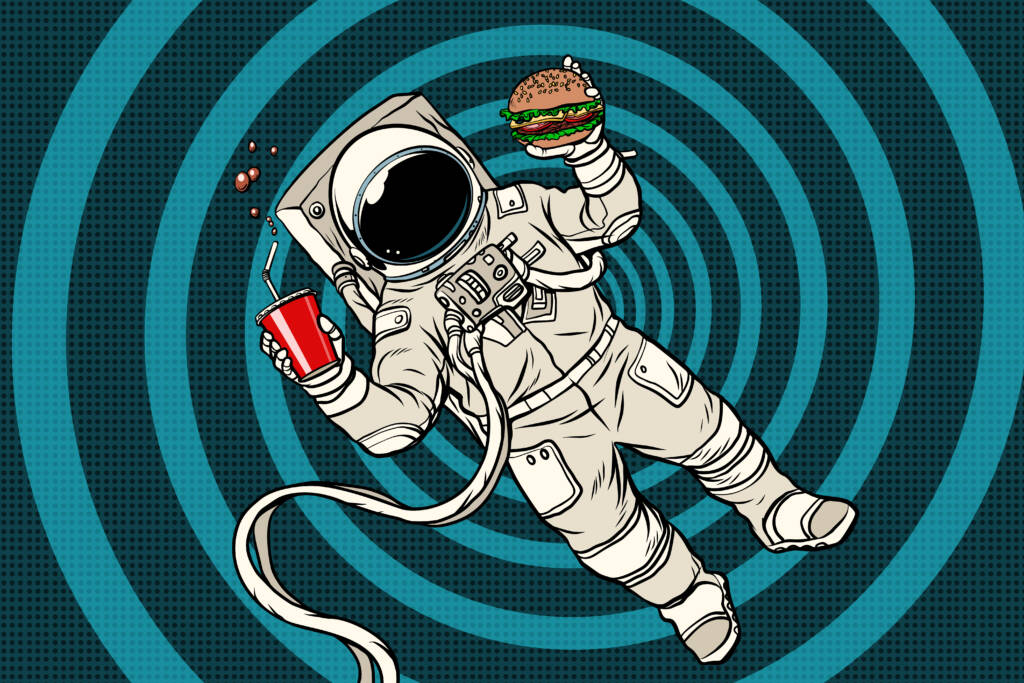 Astronaut in zero gravity with fast food. Pop art retro vector illustration